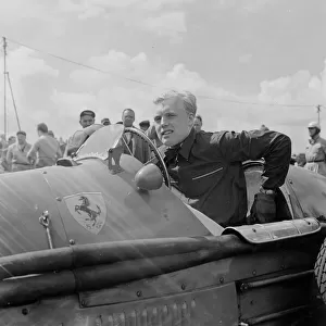Mike Hawthorn in his Ferrari 500 racing car at Silverstone July 1953