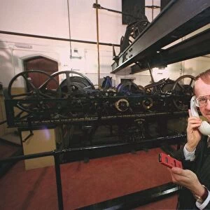 Mike McCann Keeper of the Great Clock December 1999 checks the time - by telephone