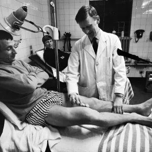 Mike Summerbee being examined (far left) whilst Colin Bell (right) awaits treatment Mike Summerbee being examined (far left) whilst Colin Bell (right) awaits treatment