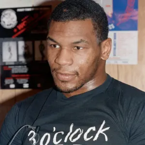 Mike Tyson takes a break from training ahead of his bout with James Bonecrusher Smith
