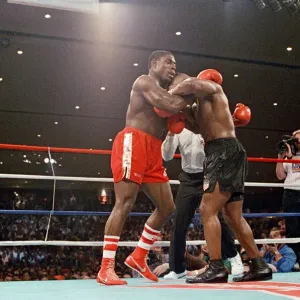 Mike Tyson contro Frank Bruno per i titoli pesi massimi WBA, WBC, IBF e lineare. Mike Tyson contro Frank Bruno per i titoli pesi massimi WBA, WBC, IBF e lineare.