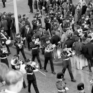 A military band performing, walking through the streets as they take part in the Lord A military band performing, walking through the streets as they take part in the Lord