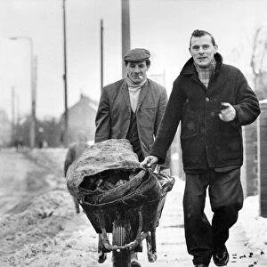 Miners Alf Wood and Raymond Varty delivering coal to the old and sick