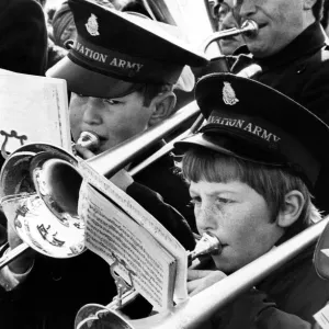 Mini musicians blow their cares away during the South Shields Procession of Witness Mini musicians blow their cares away during the South Shields Procession of Witness