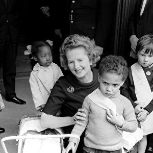 Minister of Eductaion Maggie Thatcher with young children. May 1972