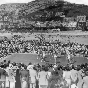 The Mirror 8 acrobatic display team entertain the crowd on the beach at Llandudno in