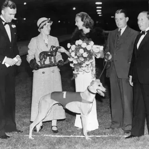 Miss Betty Davis holding bouquet star of City Films presenting the Daily Mirror £ Miss Betty Davis holding bouquet star of City Films presenting the Daily Mirror £