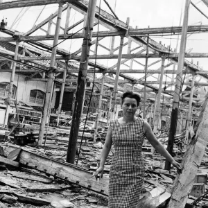 Miss Eileen Harris standing in the rubble which was once St. Johns Market, Liverpool Miss Eileen Harris standing in the rubble which was once St. Johns Market, Liverpool