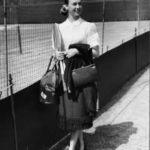 Miss Gussie Moran arrives to play June 1950 in the Kent Lawn Tennis Championships Miss Gussie Moran arrives to play June 1950 in the Kent Lawn Tennis Championships