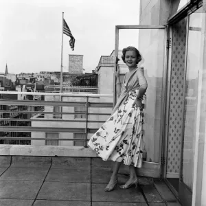 Miss Helen Landon, the American Maid of Cotton for 1957, at the Westbury Hotel Miss Helen Landon, the American Maid of Cotton for 1957, at the Westbury Hotel