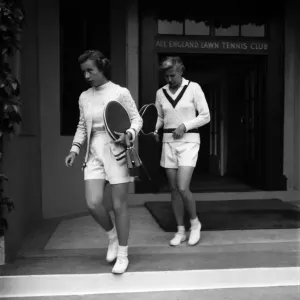 Miss Mary Connolly and Mrs. Louise Brough competing in Wightman Cup at Wimbledon Miss Mary Connolly and Mrs. Louise Brough competing in Wightman Cup at Wimbledon