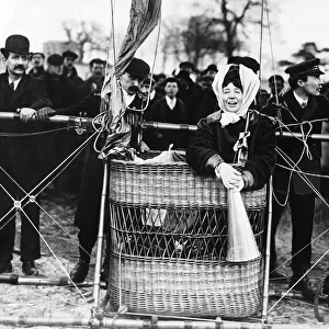 Miss Muriel Matters, suffragette, pictured in the basket of a hot air balloon with a