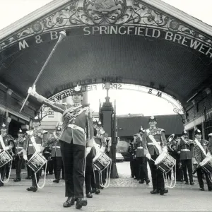 Mitchells and Butlers Brewery. The band and drum corps of the 1st Battalion
