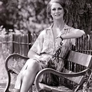 Model April Ashley pictured during a visit to Leamington spa June 1979 Sitting