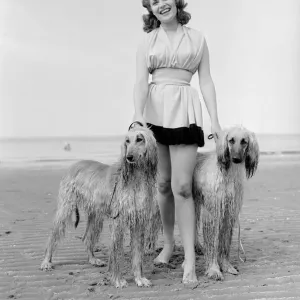 Belinda Lee with Afghan Hounds, Cliftonville Print 1953 Belinda Lee with Afghan Hounds, Cliftonville Print 1953