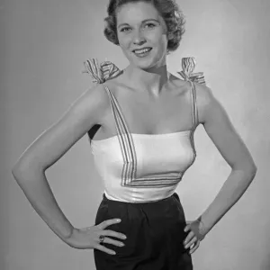 Model Betty Leslie seen here wearing a Bow Top made from a Reveille readers pattern