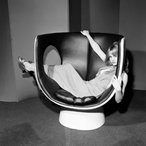 Model on a chair at the Design Centre, Haymarket, London, 13th November 1970 Model on a chair at the Design Centre, Haymarket, London, 13th November 1970