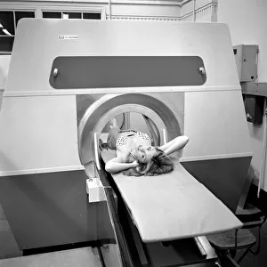 Model Gillian Duxbury in E. M. I. X-Ray scanner. April 1975 75-1905-006