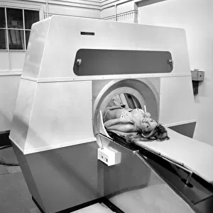 Model Gillian Duxbury in E. M. I. X-Ray scanner. April 1975 75-1905-002
