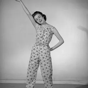 Model Jackie Jackson seen here wearing Pinafore pyjamas made from a Reveille readers
