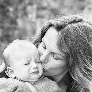 Former model Jean Shrimpton, 36, pictured with baby son Thaddeus, aged 3 months