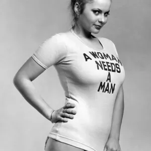 A woman in a suggestive pose for a print advertisement