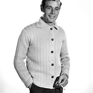 Model John Handy wearing cardigan in Reveille Studio. 1960