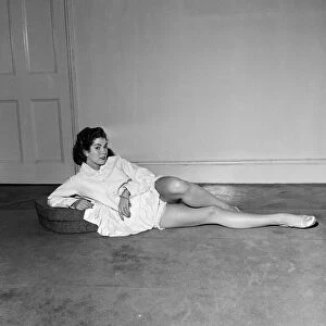Model June Roberts wearing an American designed nightdress by Sleepwear firm Schrank