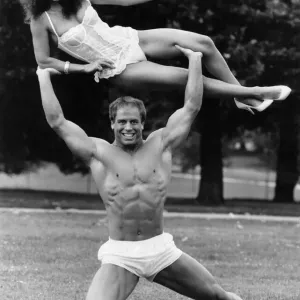 Linda Lusardi Lifted by Strongman Julien Moss Print