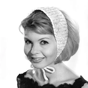 Model Liz Duke wearing a headscarf. December 1962 P008882