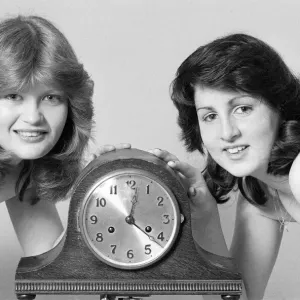 Model reminding people to put their clocks forward by one hour at the start of British Model reminding people to put their clocks forward by one hour at the start of British