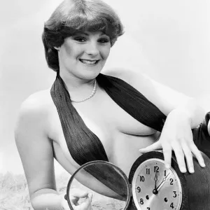 Model reminding people to put their clocks back by one hour at the end of British Summer Model reminding people to put their clocks back by one hour at the end of British Summer