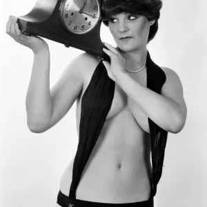 Model reminding people to put their clocks back by one hour at the end of British Summer Model reminding people to put their clocks back by one hour at the end of British Summer