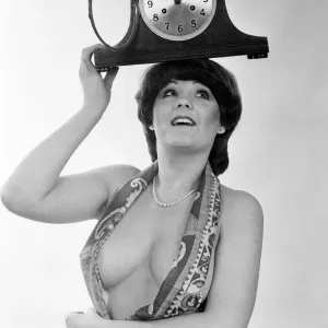 Model reminding people to put their clocks back by one hour at the end of British Summer Model reminding people to put their clocks back by one hour at the end of British Summer