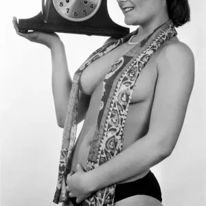 Model reminding people to put their clocks back by one hour at the end of British Summer Model reminding people to put their clocks back by one hour at the end of British Summer