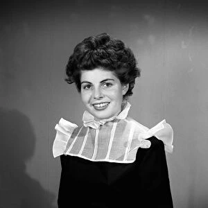 Model showing the collar fashion Puritan look Wearing a black dress with high