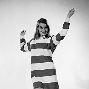 Model with striped jumper