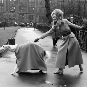 Model Vicki Hodge with dog Kika a Borzoi dog both wearing Maxi coats Model Vicki Hodge with dog Kika a Borzoi dog both wearing Maxi coats