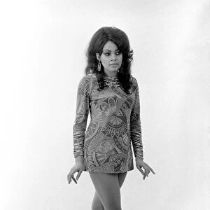Model Vicki Richards wearing a patterned mini dress. October 1969 Z10451