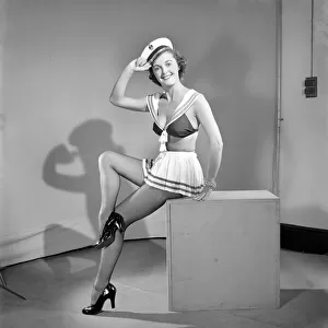 Model wearing fancy dress sailors outfit. 1959 E34
