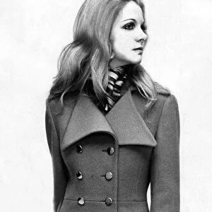 A model wearing a maxi coat