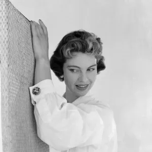 1955 Print: Model Wearing Wrist Jewelry and Cuff-Link