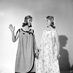 Models Baker twins wearing night dresses. July 1962