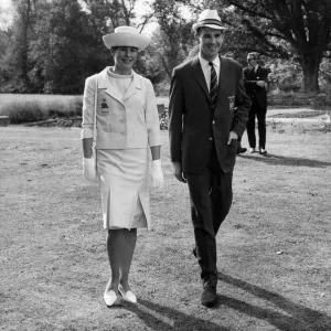 Models wearing male and female uniforms for the British athletes in the upcoming Olympic Models wearing male and female uniforms for the British athletes in the upcoming Olympic