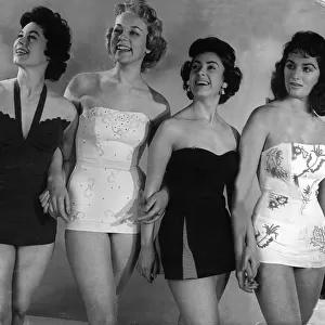 Models wearing swimsuit designs 1955