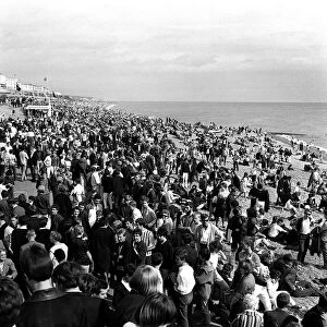 Mods and rockers gather on Brighton beach in August 1964