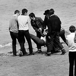 Mods youth culture throwing a person in to the sea on Margate beach