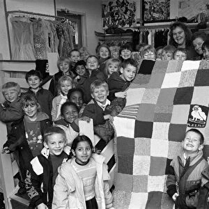 Moldgreen Junior and Infants School pulls with their knitted blanket