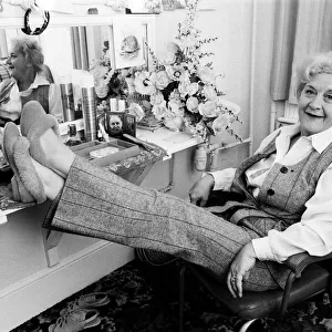 Mollie Sugden relaxing in her dressing room. 17th August 1980