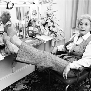 Molly Sugden relaxing in her dressing room. 17th August 1980
